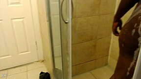 African babe with a big booty gets wet in the shower