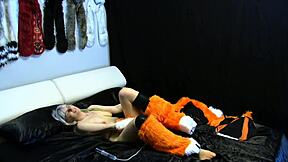 MILF in sexy costume teases with striptease and nylon play