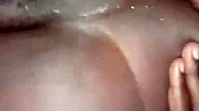 African-American wife pleasures herself with anal play