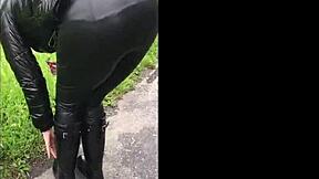 Married woman in leather leggings and wellies for a kinky phone show