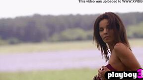 Natalie Costello's big natural tits and outdoor striptease