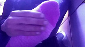 Pink socks and tired feet are what I am wearing and I am alone in this video
