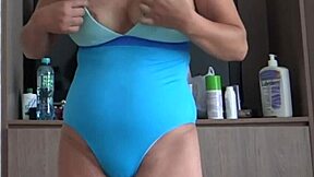 Mature Latina shows off her big ass on the beach