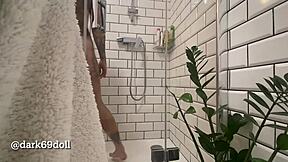 watch dark69doll soap up her tattooed body in steamy shower