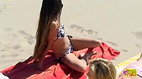 After a wild beach volleyball game, these hot lesbians head inside to lick and bang each other hard.