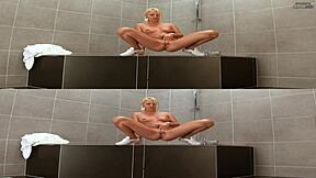 Softcore solo video of a busty blonde spreading her legs