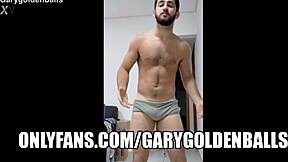 Big bulged gay hunk shows off his big cock in homemade video