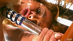 Sexy tanned lesbian rides a sex toy to orgasm