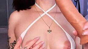 Tattooed teen's solo play with dildo