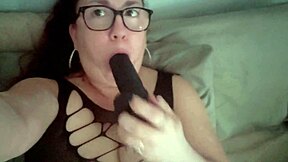 Amateur housewife enjoys her large black dildo