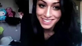 Transgender beauty enjoys a solo session with a dildo