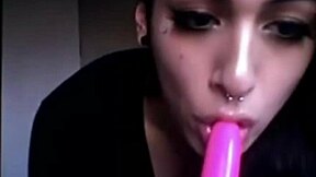 Transgender beauty enjoys a solo session with a dildo