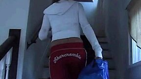 Blonde Lexy teases and undresses in a panty tease scene