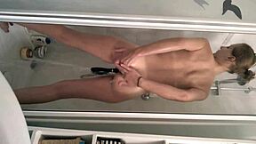 Brunette teen with hairless pussy enjoying a solo shower