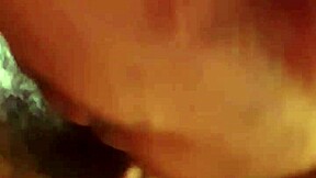 Busty ebony babe gives a hot blowjob