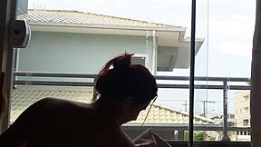 Enjoying a secret view of a woman teasing with her big tits and no panties
