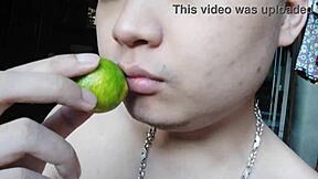 Asian woman pleasures herself with oral stimulation