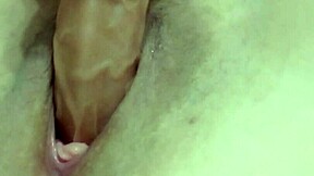 Attractive mature woman self-pleasures with a sex toy