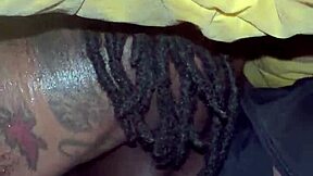 A seductive black woman with tattoos licks and swallows a pussy all night