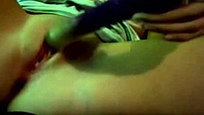 Young girl pleasures herself with dildo on webcam