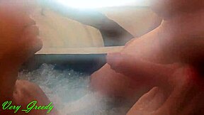 A foodie gives a blowjob and swallows cum outside in the jacuzzi