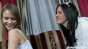 Young lesbian women indulge in mutual masturbation with a lengthy dildo