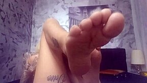 Foot fetish camgirl teases with cute face and small tits