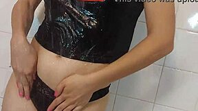 Young female college student pleasures herself in the shower