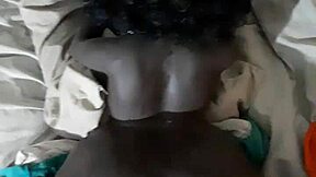 A big black ass receives a facial cumshot in a POV shot