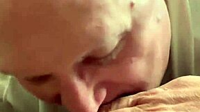 Gay man performs oral sex on black penis