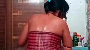 Indian lesbian couple explores their desires in a steamy bathroom encounter