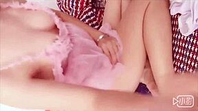 Asian beauty on webcam indulges in foot play and reveals her delicate pink genitalia