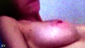Softcore video of a girl giving a BJ on the couch