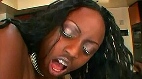 Ebony's craving for cock leads to self-penetration and intense backdoor action