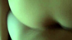 A silver bikini-clad beauty reveals her natural assets in a homemade video