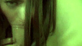 A voluptuous teenage woman with dark hair enjoys giving oral sex and engaging in sexual intercourse involving her breasts