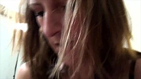 Enjoy watching a lesbian couple engage in anal play with a large dildo