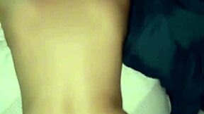 A Latina teen enjoys playing with her partner's erect penis and giving him a deepthroat blowjob while bending over