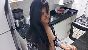 Sensual Latina woman pleasures herself in the kitchen