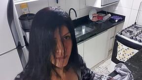 Sensual Latina woman pleasures herself in the kitchen