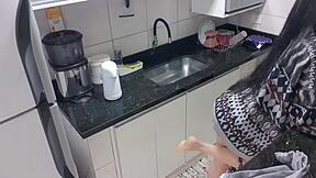Sensual Latina woman pleasures herself in the kitchen