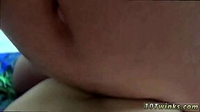 Two young gay men film their unprotected sex session with oils