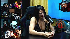 Uninhibited babe flaunts her assets and gets aroused during a podcast, leading to a wild encounter in a tent