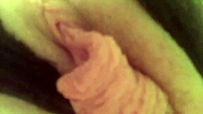 Closeup of curvy girl pleasuring herself