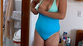 Stepmom displays her body at the beach for her stepson before sexual encounter