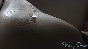 Sensual massage with oils on petite teen's body
