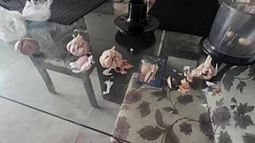 A fetish video featuring a blonde woman displaying her intimate parts