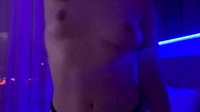 A stunning young redhead indulges in sensual self-pleasure