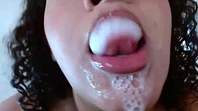 Erotic video featuring saliva play for fetish enthusiasts