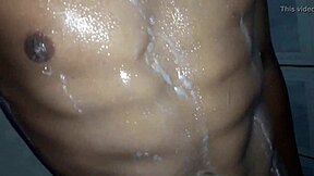 A black man participates in a group sex session and receives a large black penis in his anus